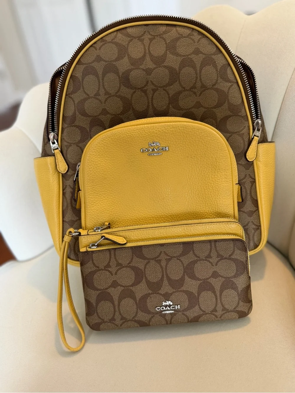 Butter Yellow Coach Backpack and Pouch